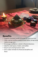Decorative setting with a pyramid, crystals, and a candle on a red cloth.